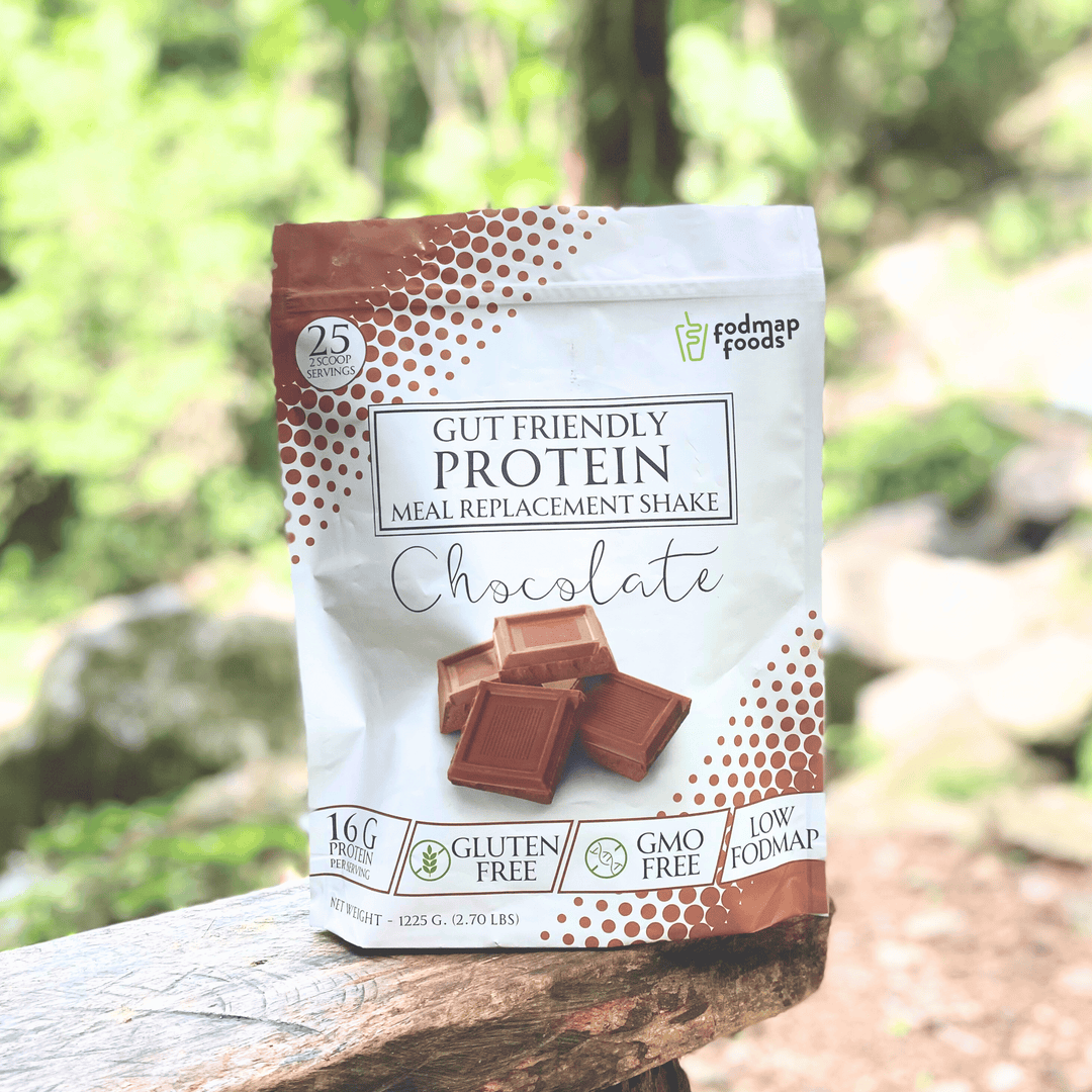 Delicious looking bag of chocolate meal replacement shake on a forest bench