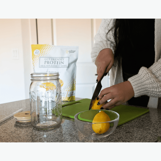 Femle-cutting-lemon-before-making-a-delicious-shake