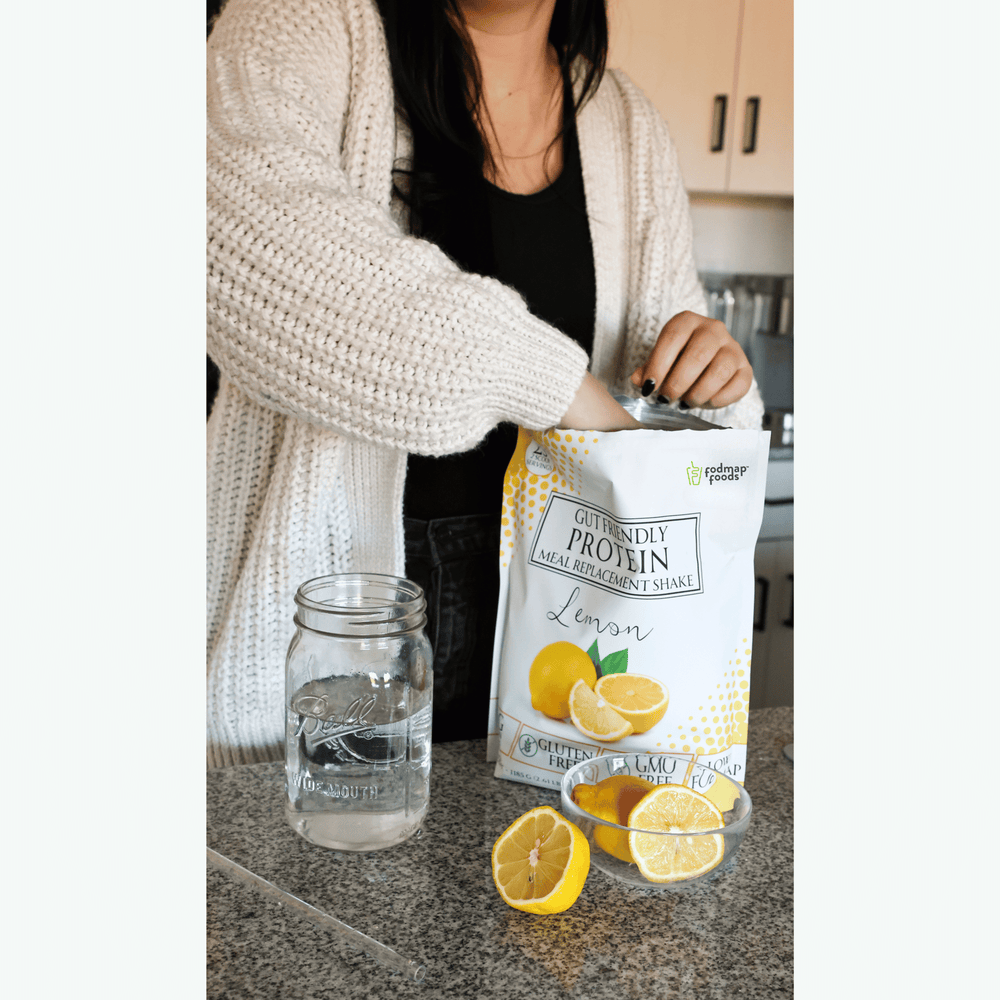 Female-making-lemon-lowfodmap-meal-replacement-shake