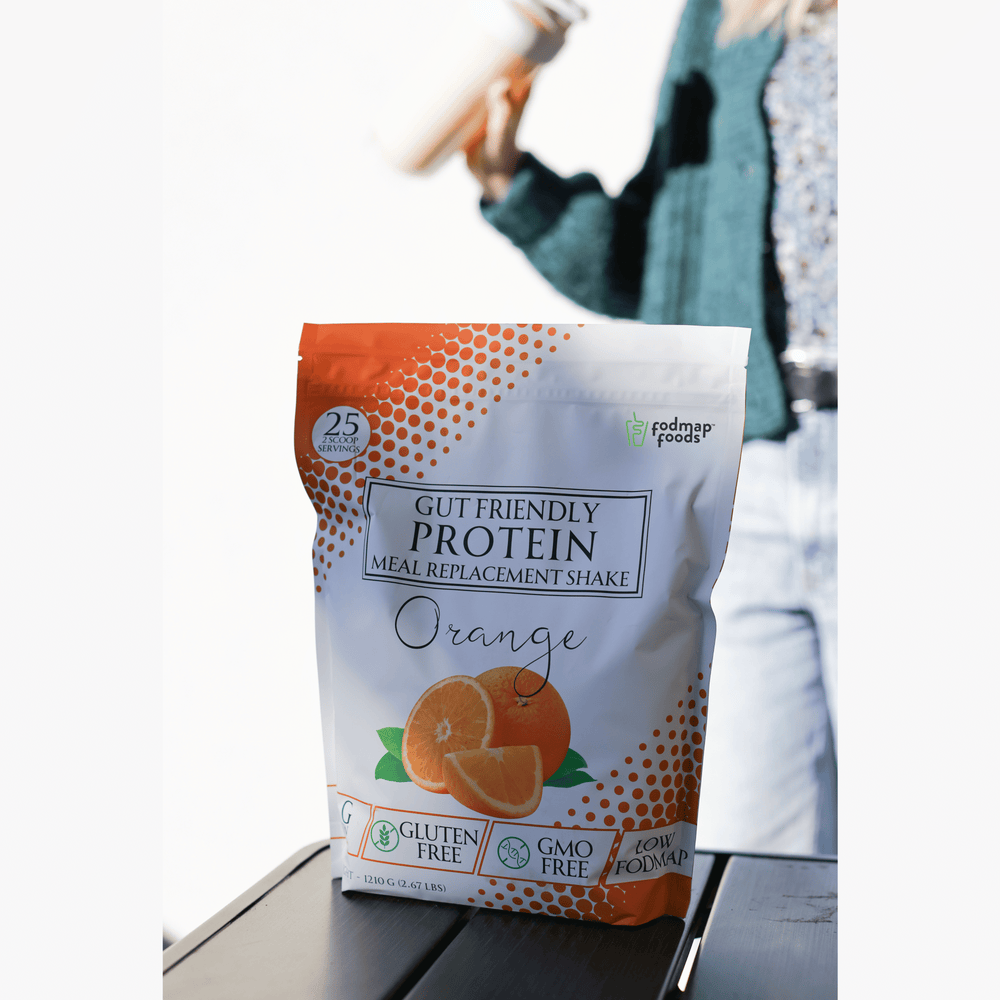 Bag-of-orange-meal-replacment-shake-with-blury-image-of-a-female-in-the-background